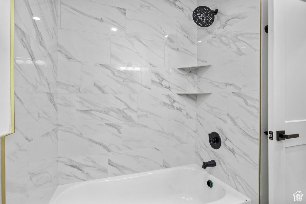 Bathroom featuring shower / bathtub combination