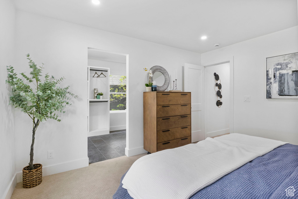 Bedroom featuring carpet floors, baseboards, and recessed lighting
