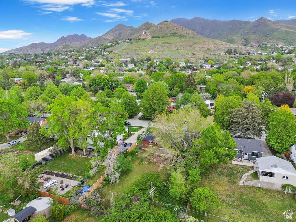 Birds eye view of property featuring a mountain view and a residential view