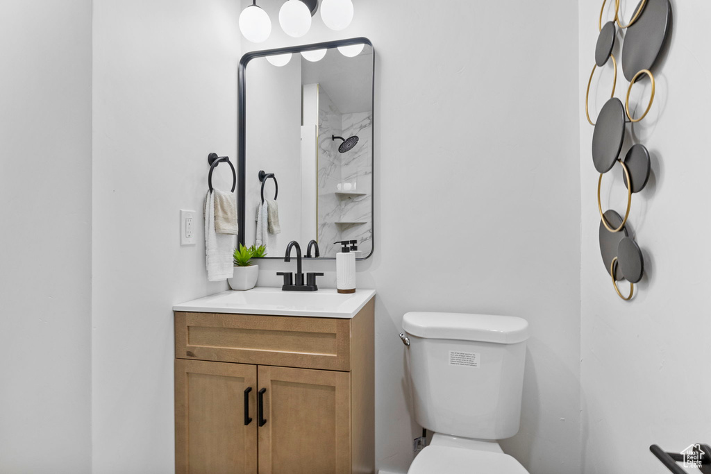 Bathroom with toilet and vanity