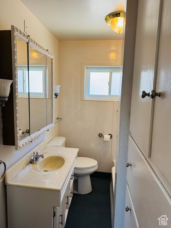 Bathroom with vanity and toilet