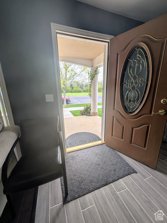 Entryway with wood finished floors
