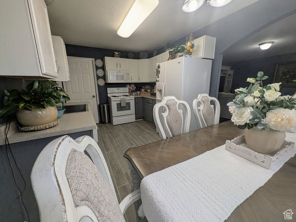 Dining area featuring wood finished floors