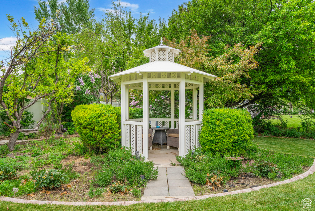 View of community featuring a gazebo and a lawn