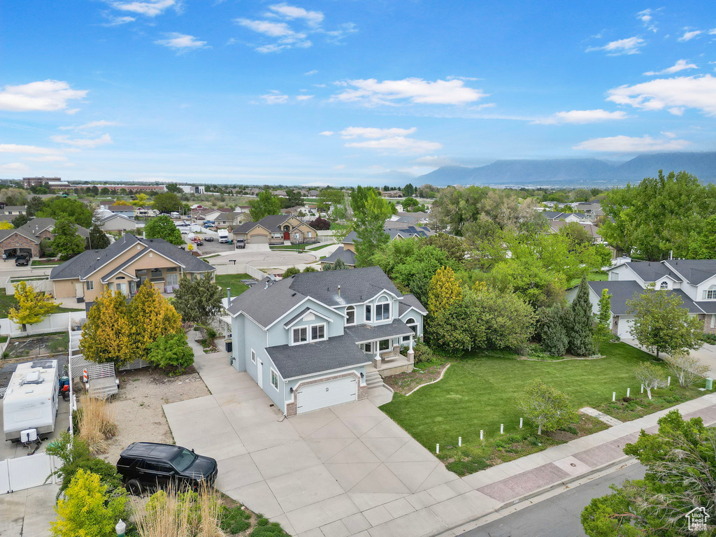 Aerial view featuring a mountain view and a residential view