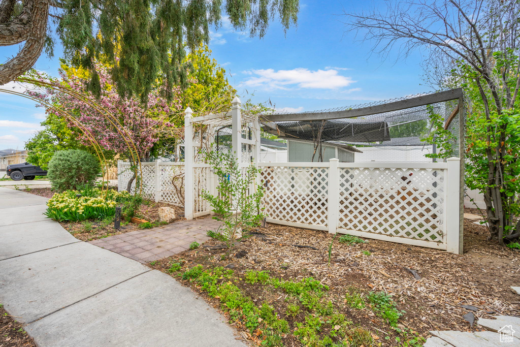 View of yard featuring fence