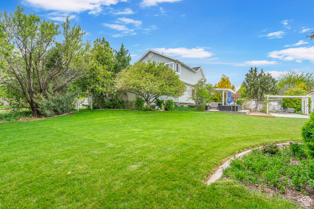 View of yard with fence
