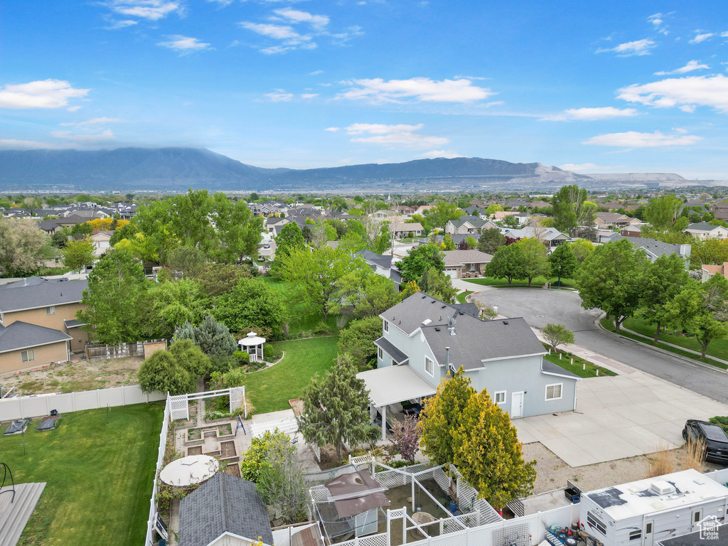 Birds eye view of property featuring a mountain view and a residential view