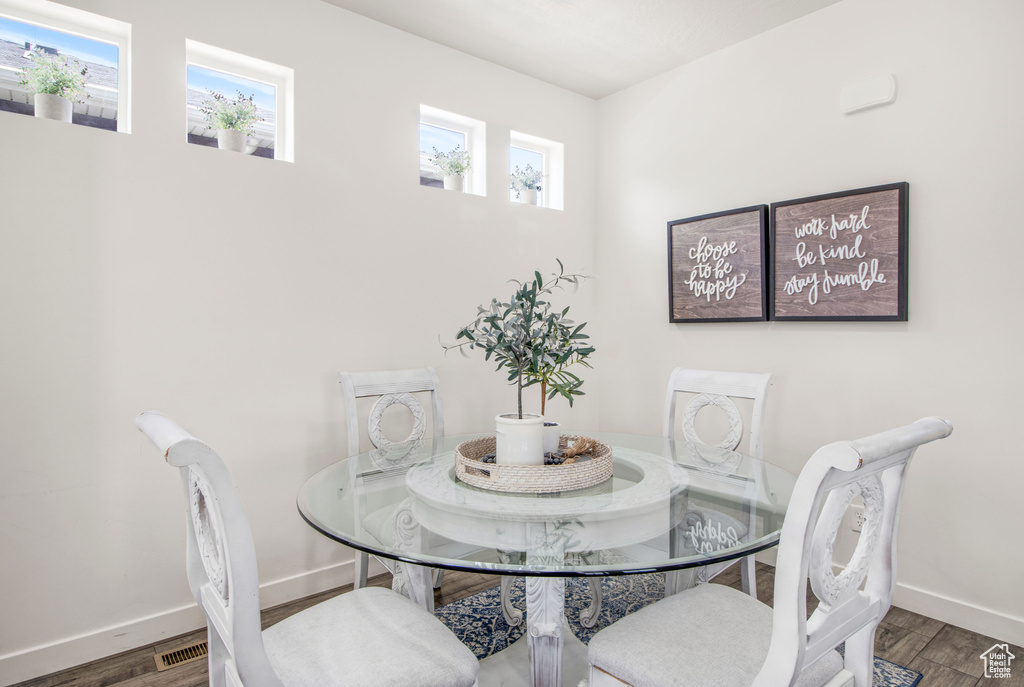 Dining room featuring baseboards and wood finished floors
