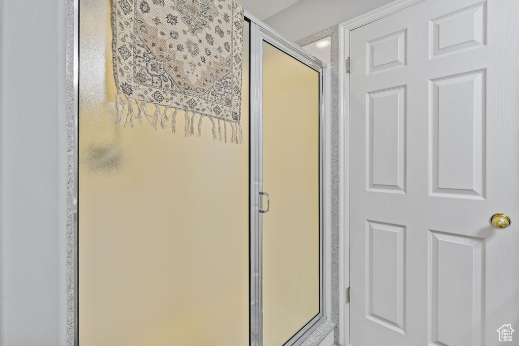 Full bath featuring a stall shower
