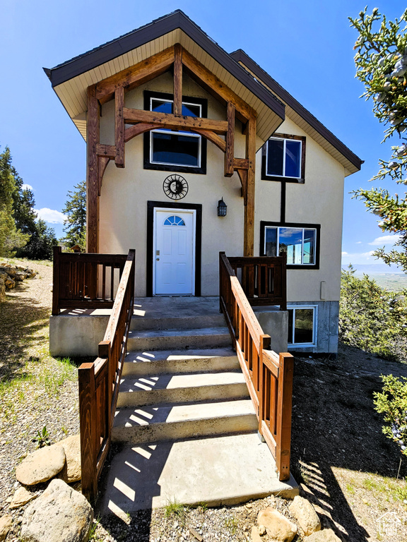 View of front of home with stucco siding