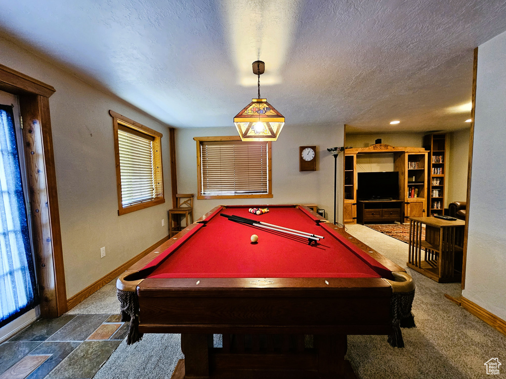 Rec room featuring a textured ceiling, baseboards, and pool table