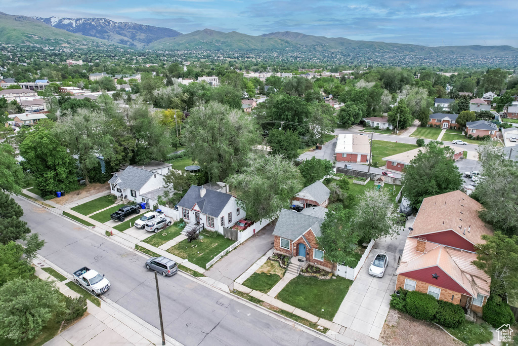 Aerial view of residential area with a mountainous background