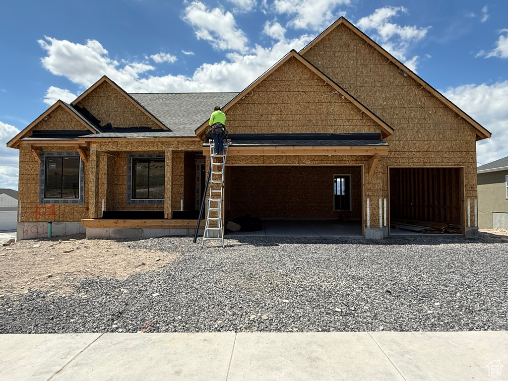 Property in mid-construction with a garage
