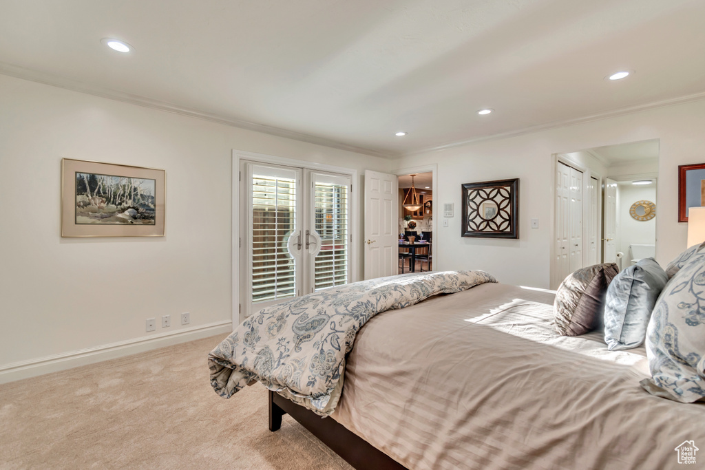 Bedroom featuring crown molding, carpet flooring, access to outside, and recessed lighting