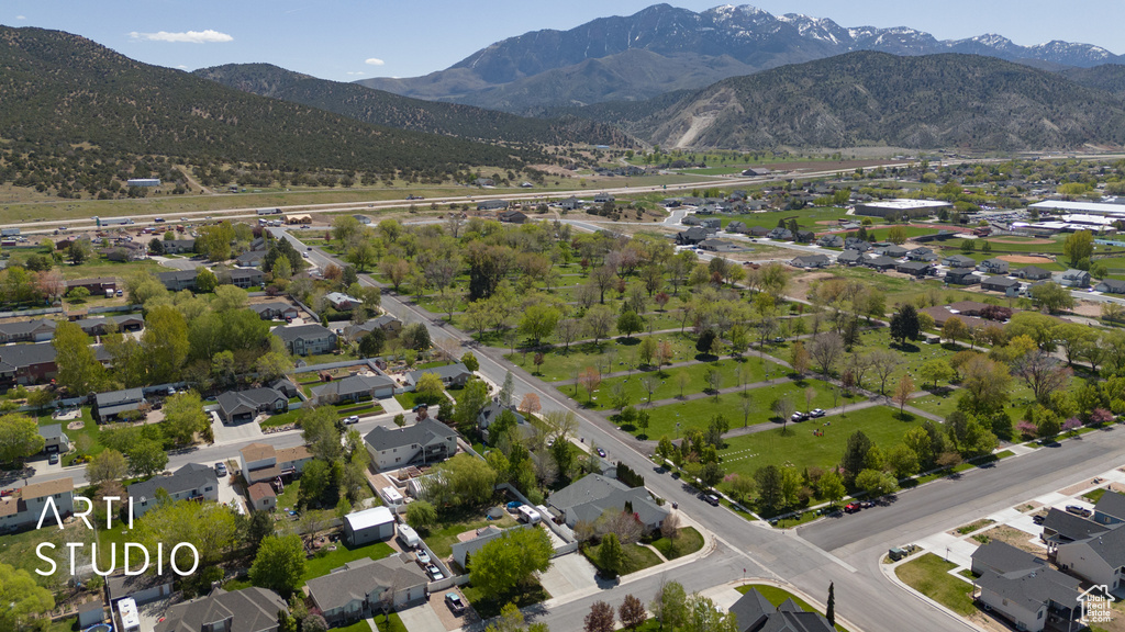 Drone / aerial view with a mountain view and a residential view