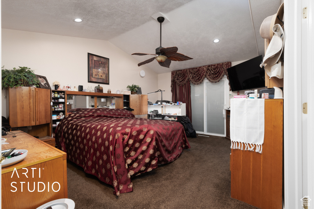 Carpeted bedroom featuring vaulted ceiling, ceiling fan, a textured ceiling, and recessed lighting