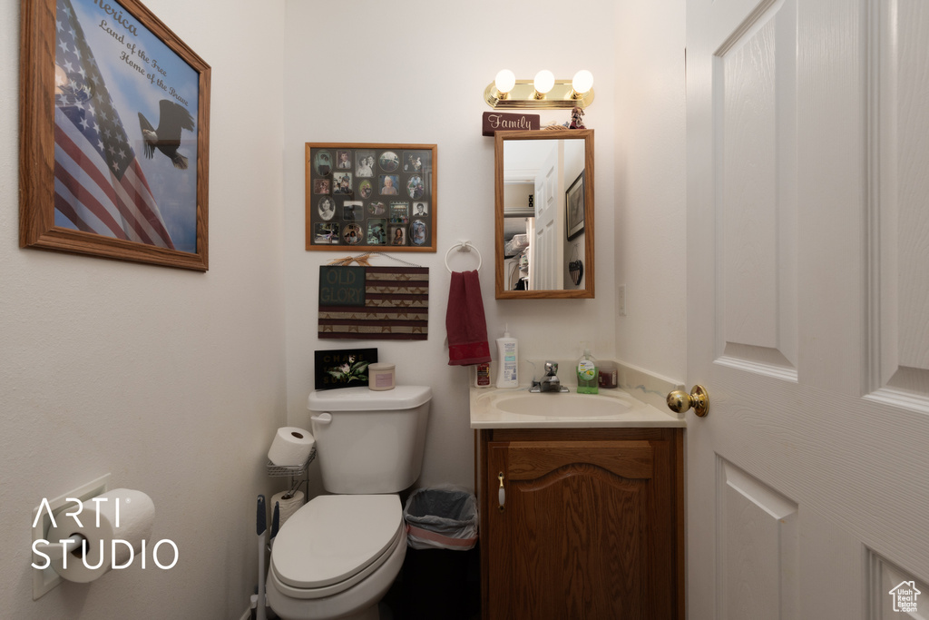Bathroom featuring toilet and vanity
