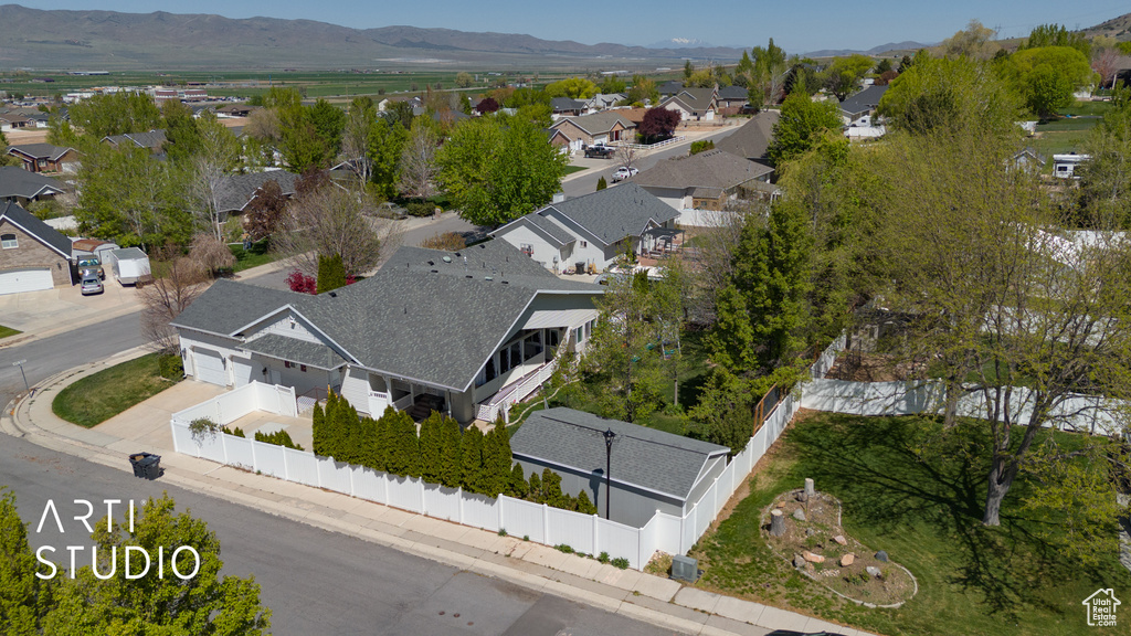 Drone / aerial view featuring a residential view and a mountain view