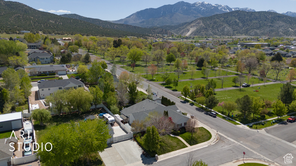 Birds eye view of property featuring a residential view and a mountain view