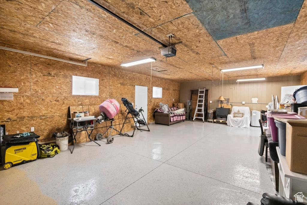 Garage featuring a garage door opener