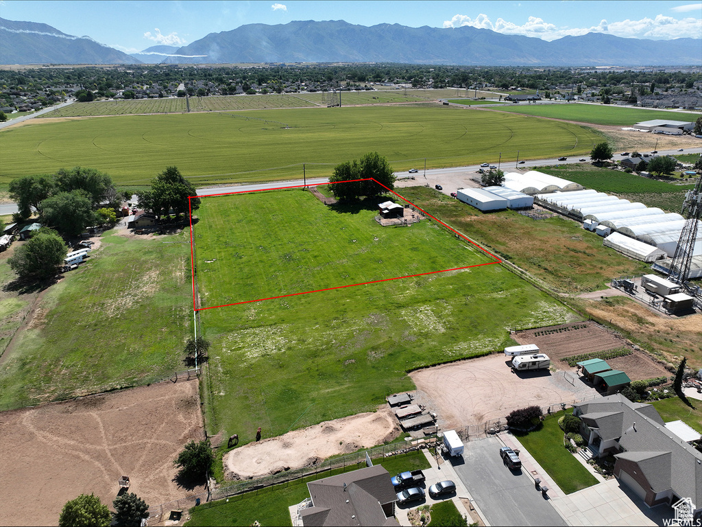 Drone / aerial view with a rural view and a mountain view