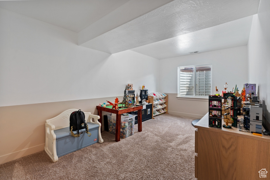Interior space with baseboards and carpet floors