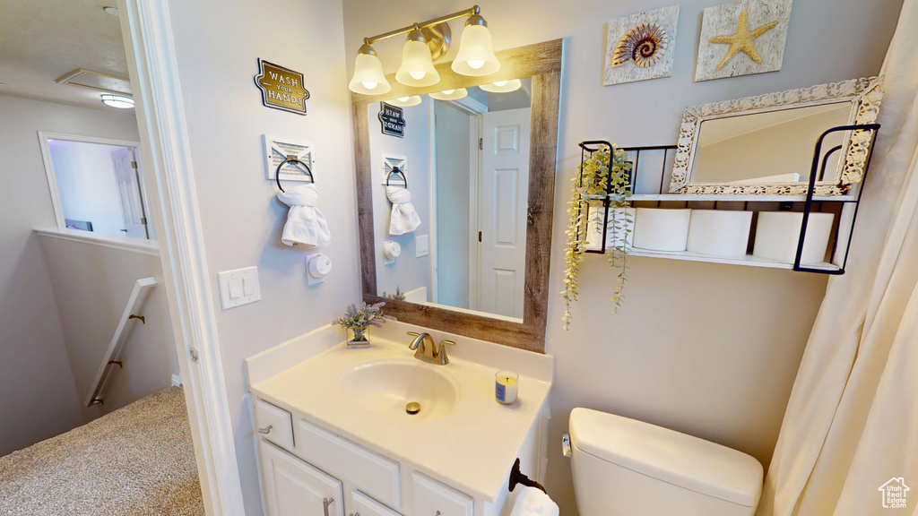 Bathroom with vanity and toilet