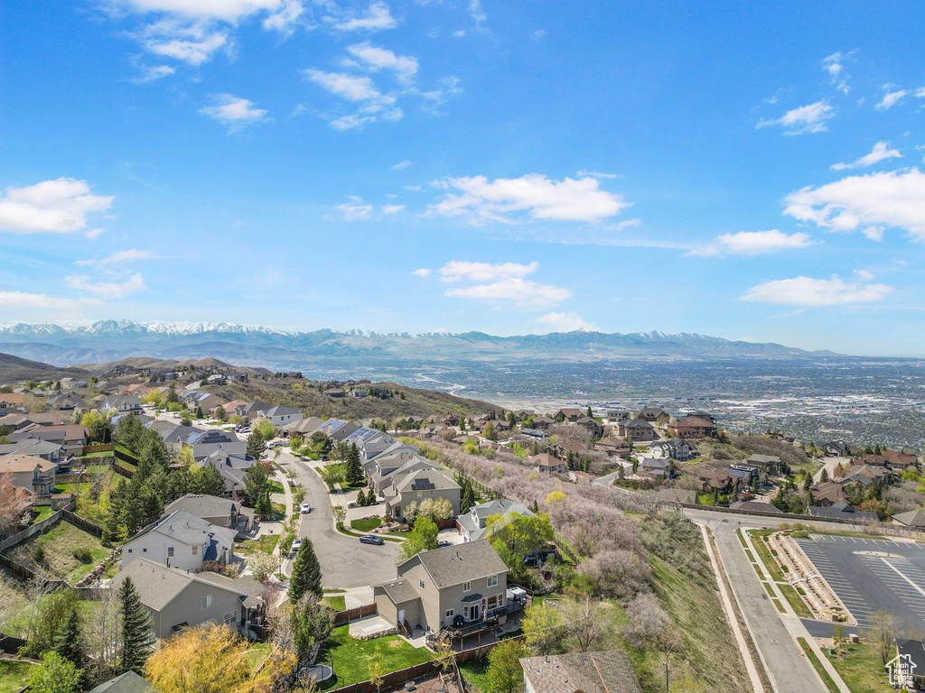 Birds eye view of property featuring a mountain view and a residential view