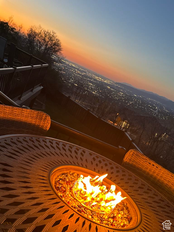 Balcony featuring an outdoor fire pit
