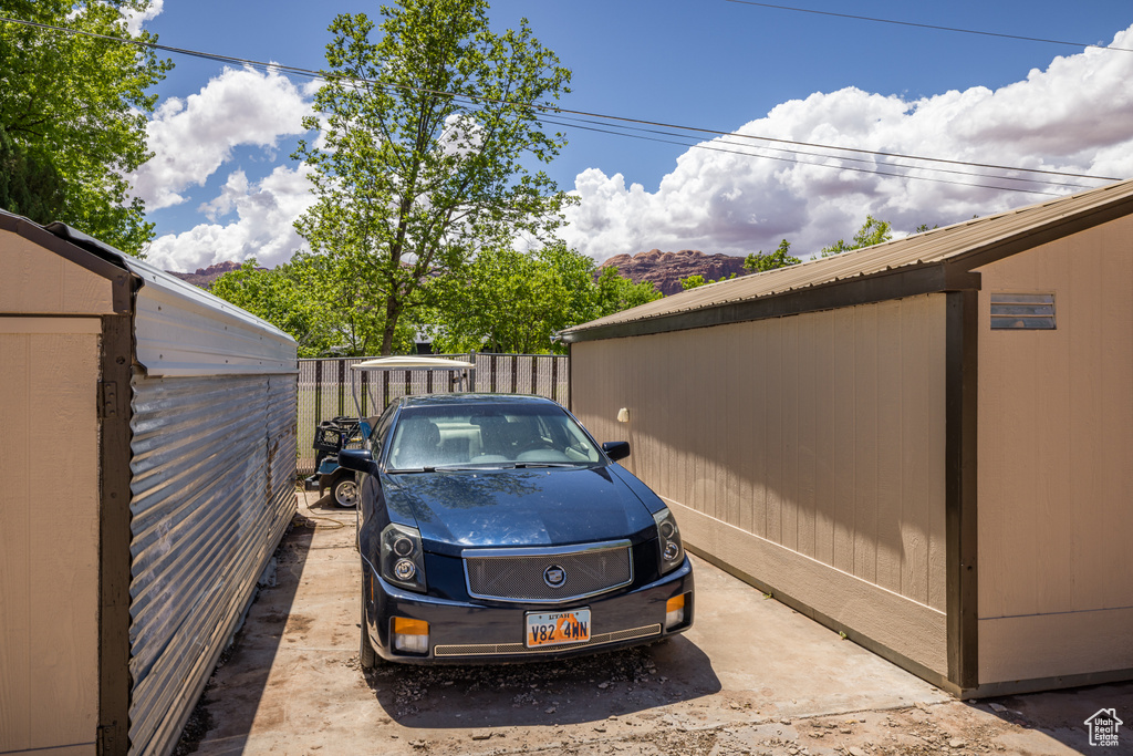 View of parking featuring fence