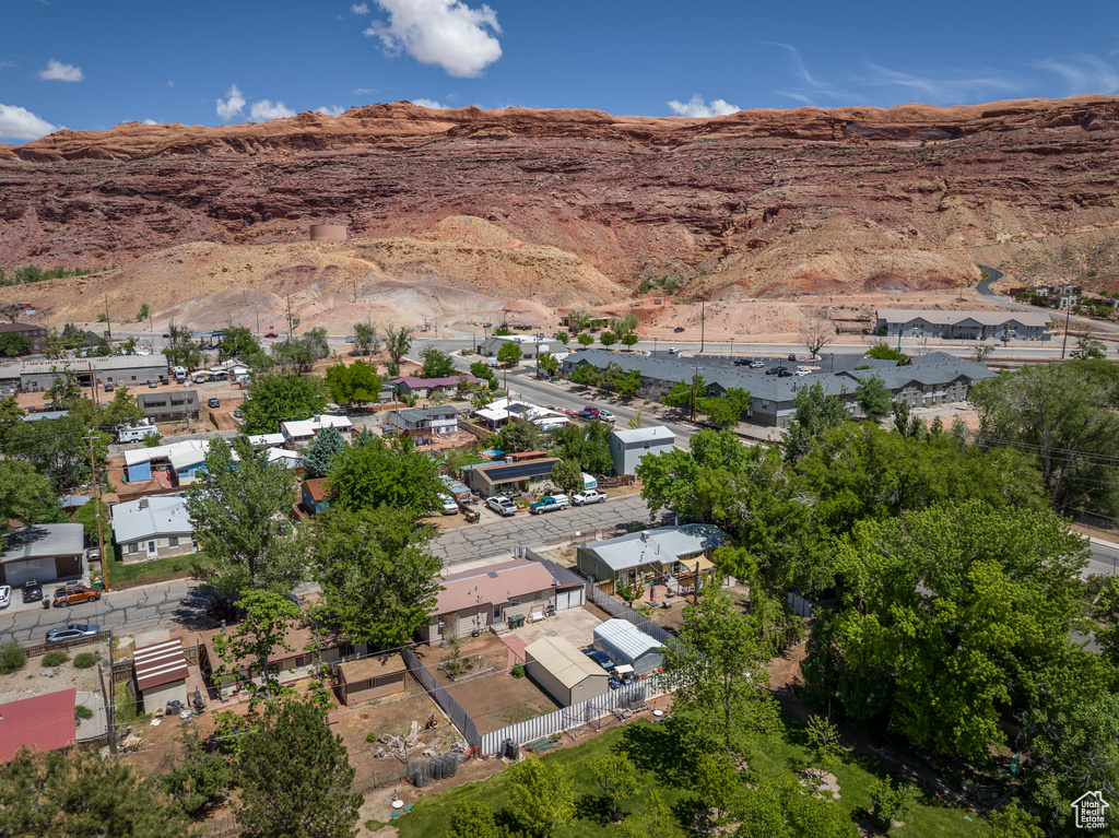 Aerial view of property\'s location with mountains and nearby suburban area