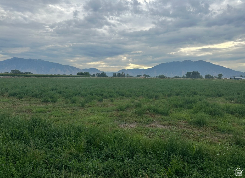 Property view of mountains with a rural view