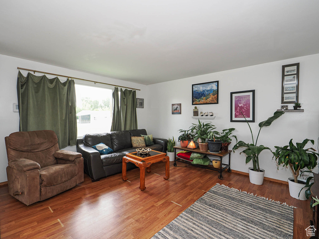 Living area with wood finished floors