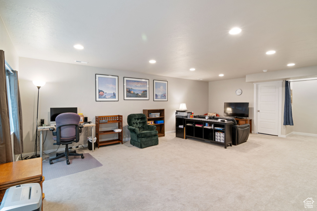 Office area featuring recessed lighting, light carpet, and baseboards