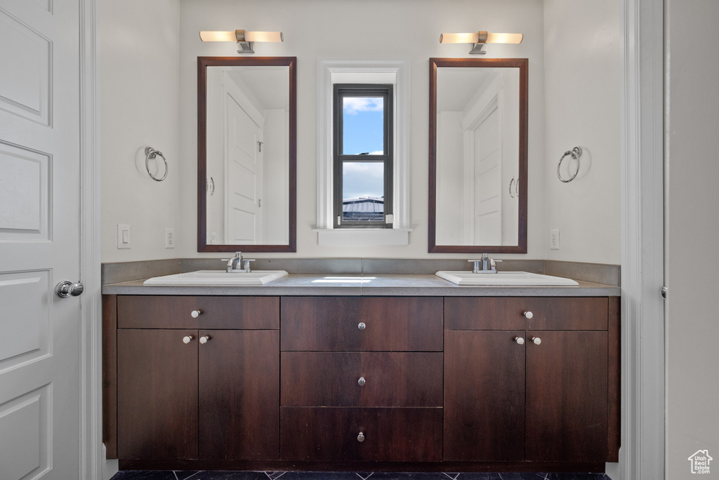 Bathroom with double vanity and a sink