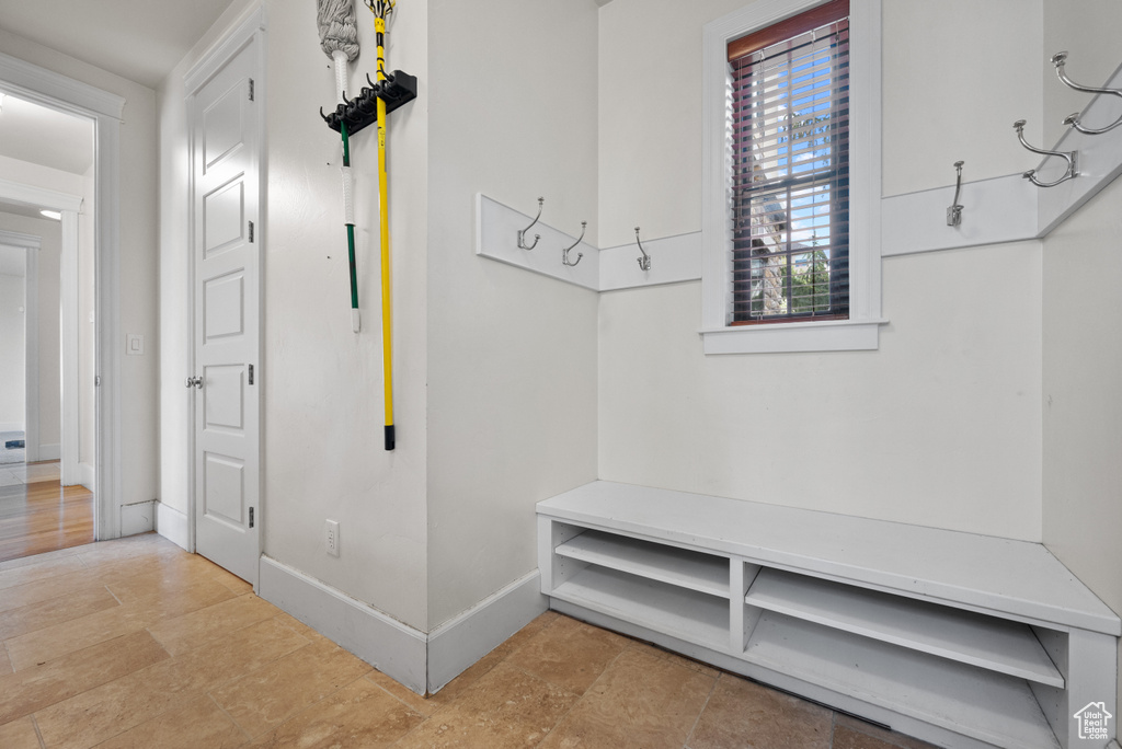 Mudroom featuring baseboards