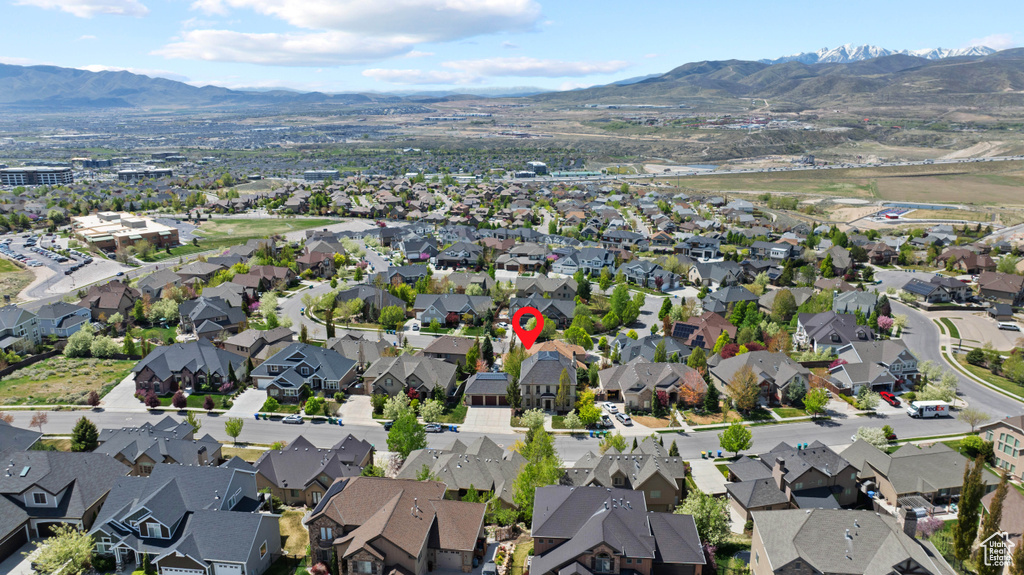 Drone / aerial view with a mountain view and a residential view