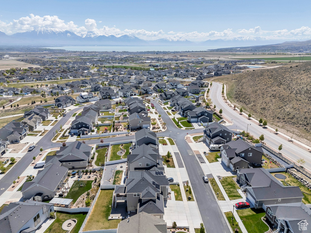 Drone / aerial view featuring a mountain view and a residential view