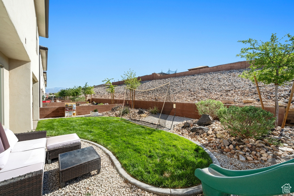 View of yard featuring a fenced backyard