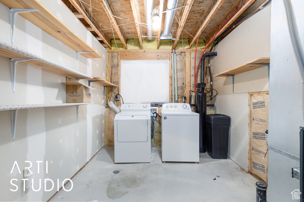 Laundry room featuring washing machine and clothes dryer