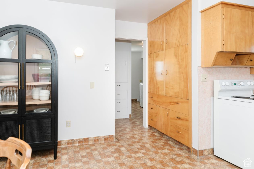 Interior space with light floors and baseboards
