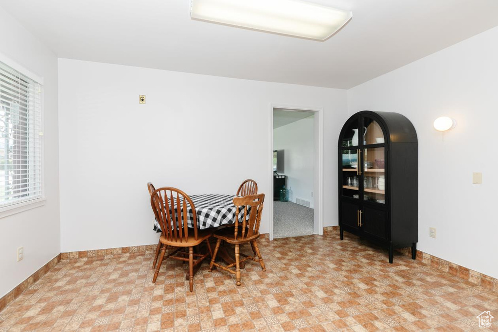 Dining space featuring baseboards