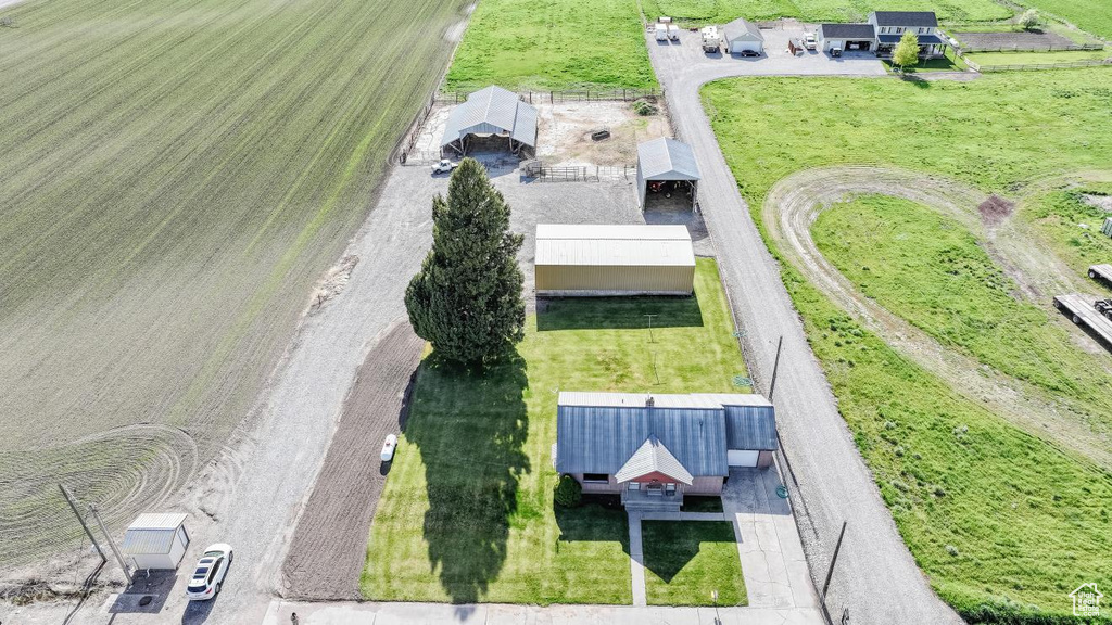 Birds eye view of property featuring a rural view