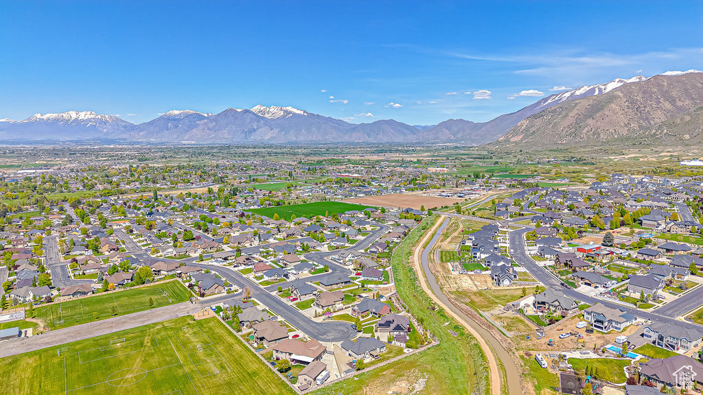 Aerial perspective of suburban area featuring mountains