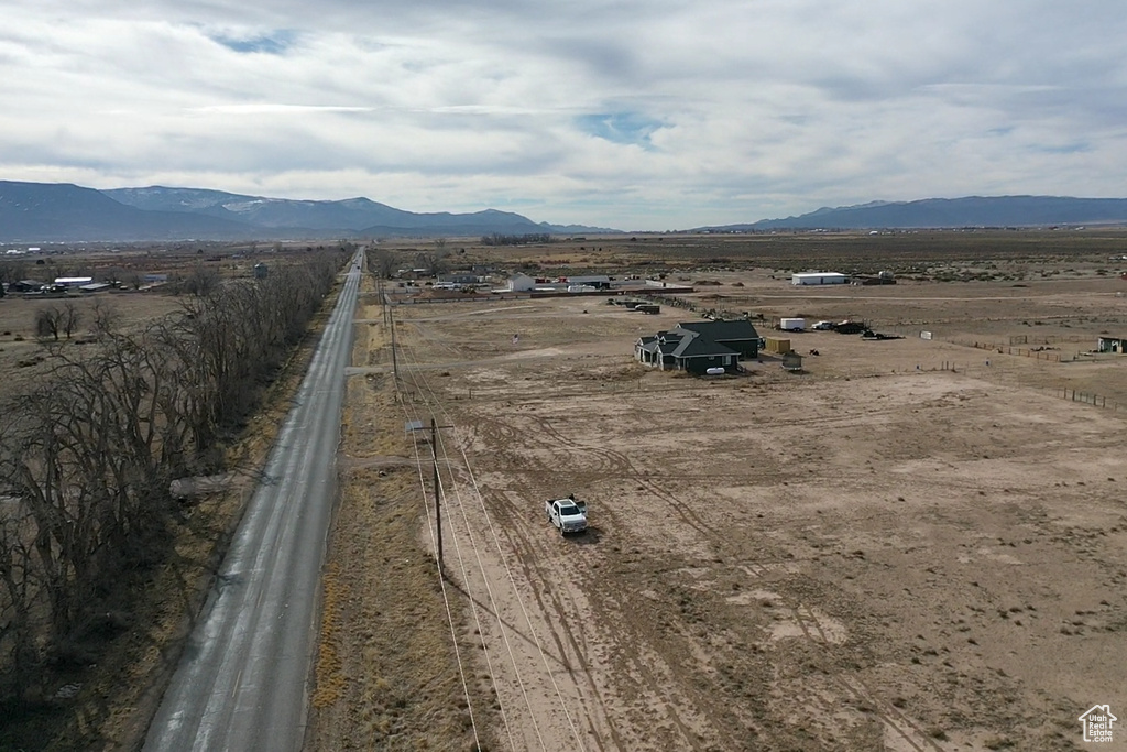 Drone / aerial view with a mountain view and a rural view
