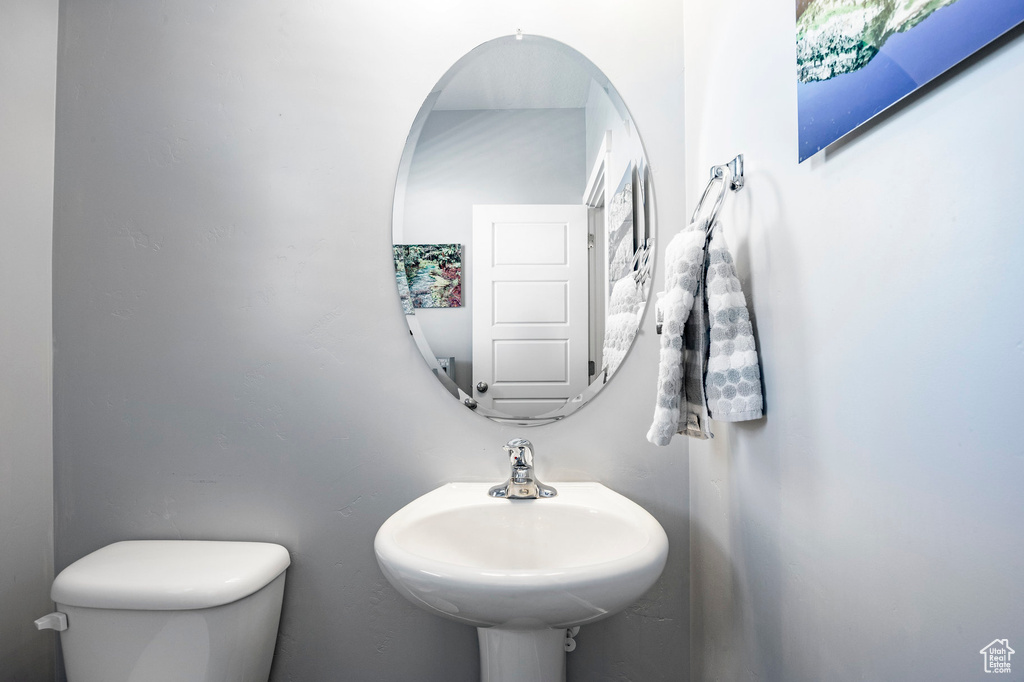Bathroom with toilet and a sink