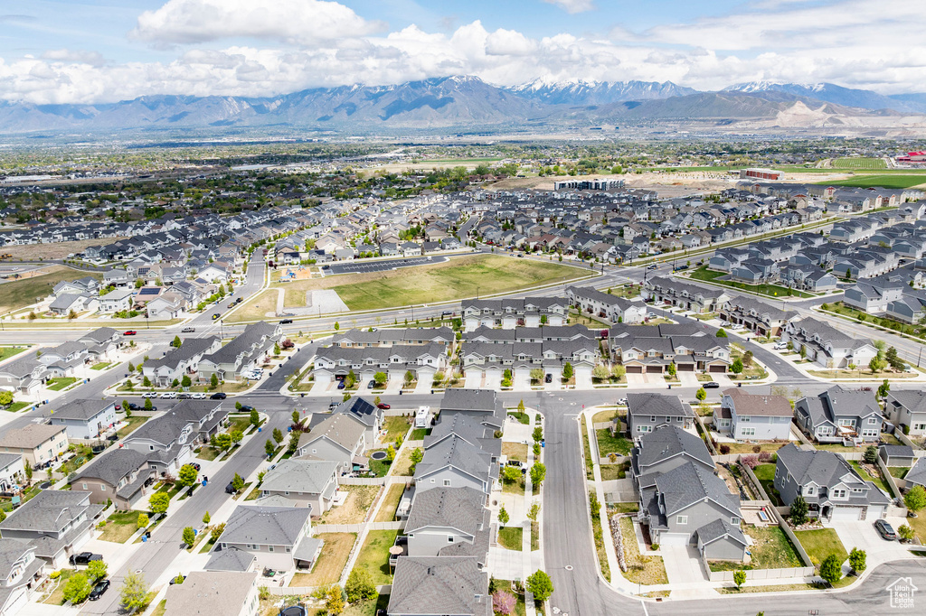 Aerial view of residential area with a mountain backdrop