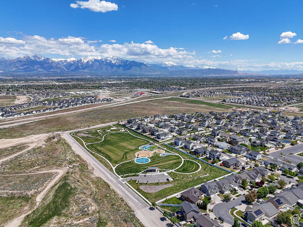 Aerial view of property\\\'s location with a mountain backdrop and nearby suburban area