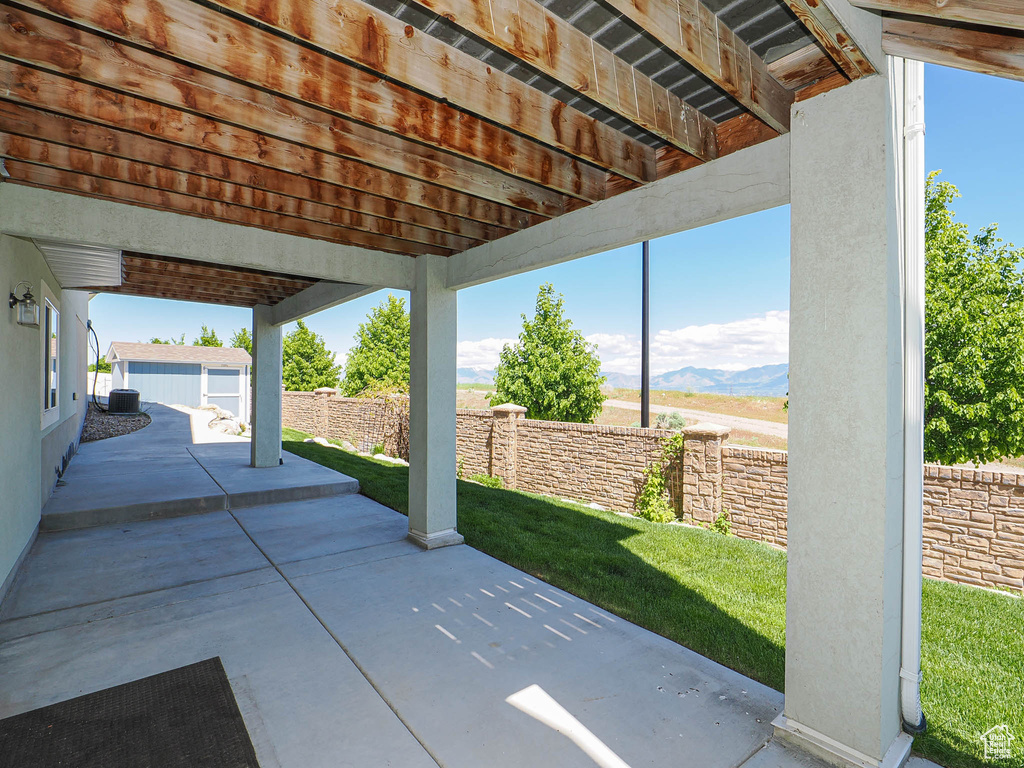 View of patio with a mountain view